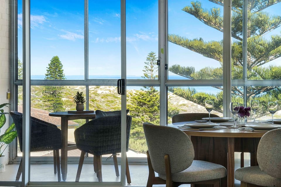 Dine with a view—enjoy meals beside panoramic windows overlooking the coast.