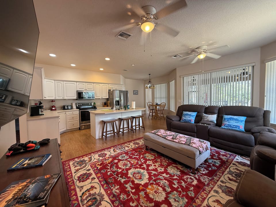 Get cozy with the electric fireplace and blankets in the ottoman