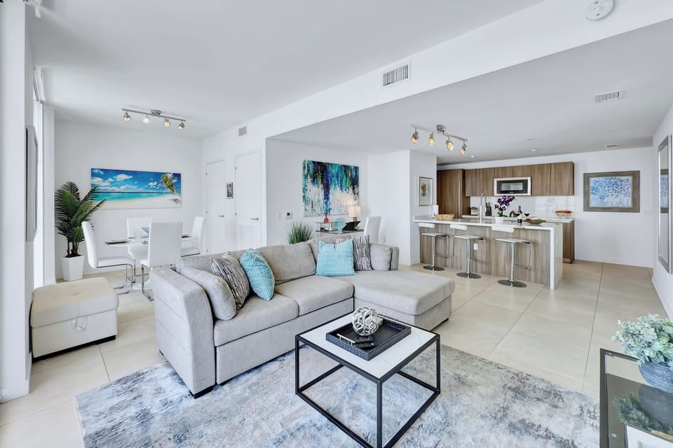 Welcome to the Tiffany Shoreline PH.  Seamless open-concept living spaces, with gorgeous city + partial ocean views.