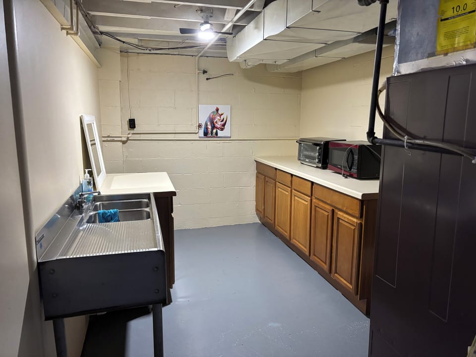 Basement is equipped with additional kitchenette, mini-fridge and more.