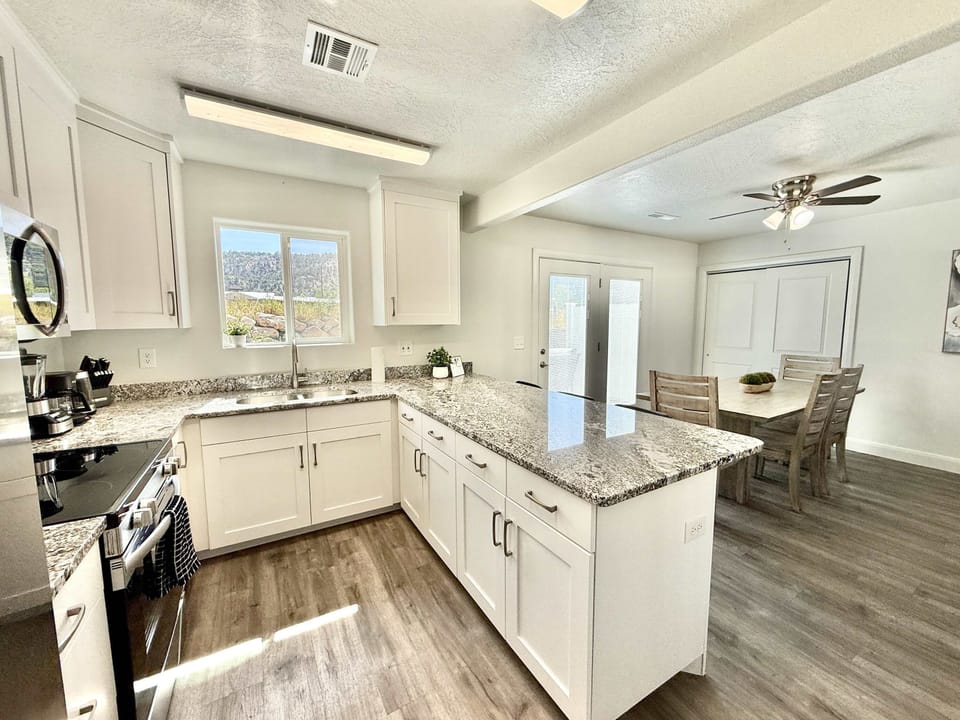 The kitchen in Unit 2 is fully stocked (no dishwasher) and has ample counter space for all your culinary needs