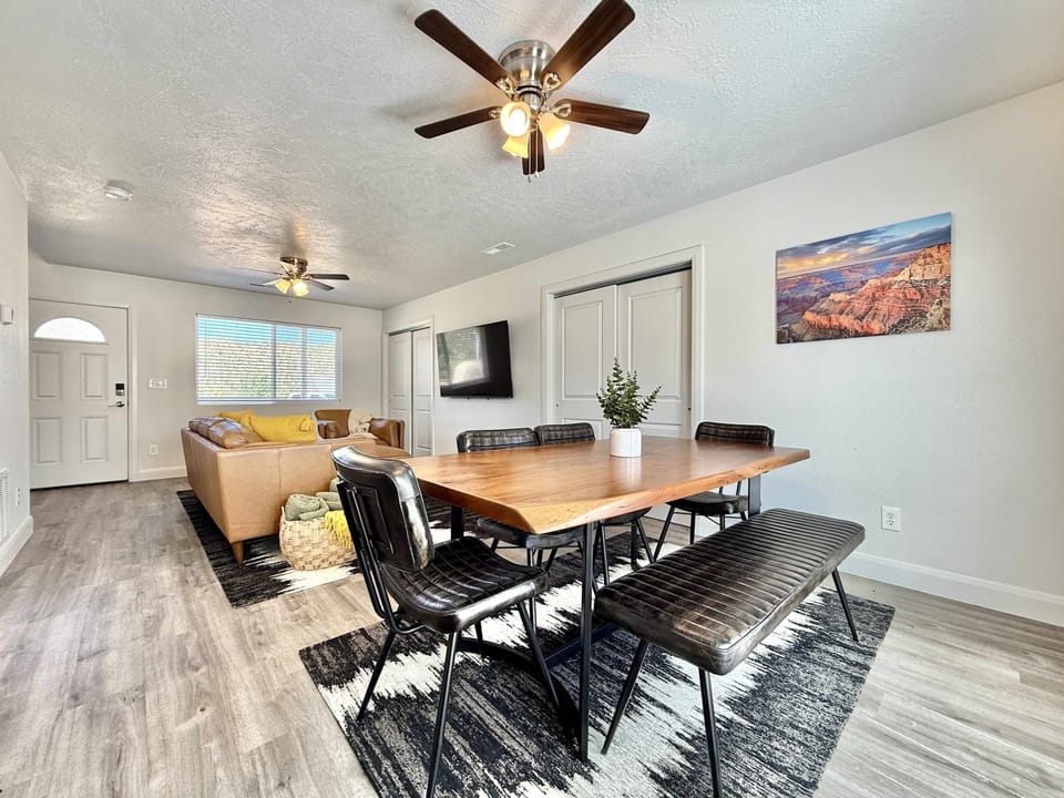 The dining area in Unit 1 seats 6 with additional seating at the bar in the kitchen