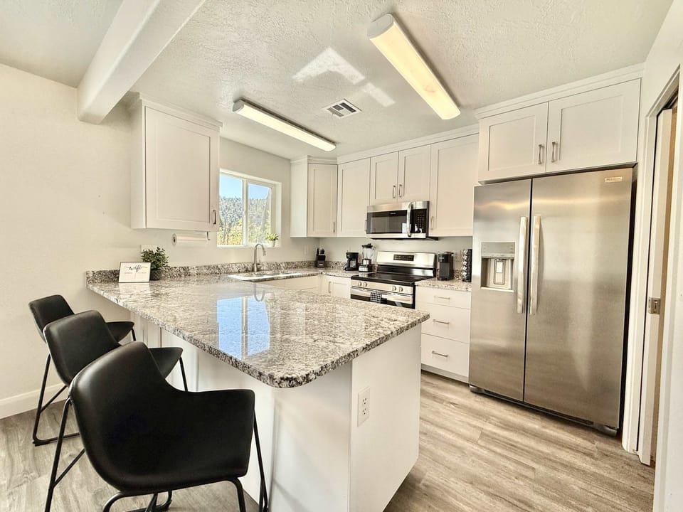 New appliances awaite you in this fully stocked kitchen with plentyt of counterspace
