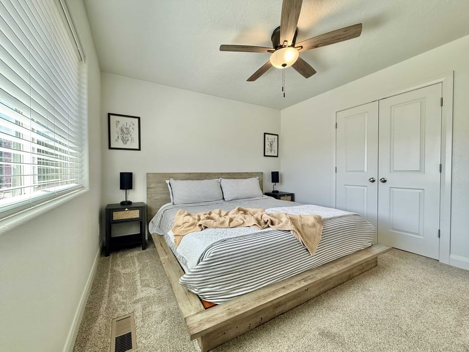 Bedroom 2 featurs a comfortable king sized bed