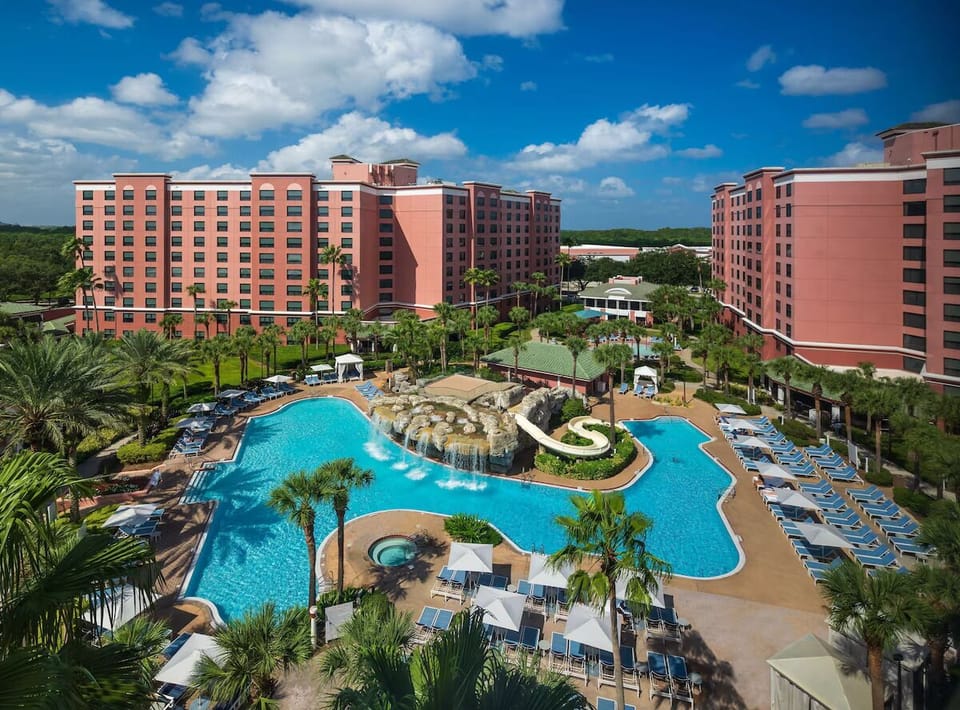 Dive into resort-style bliss with sweeping pool and lounge views.