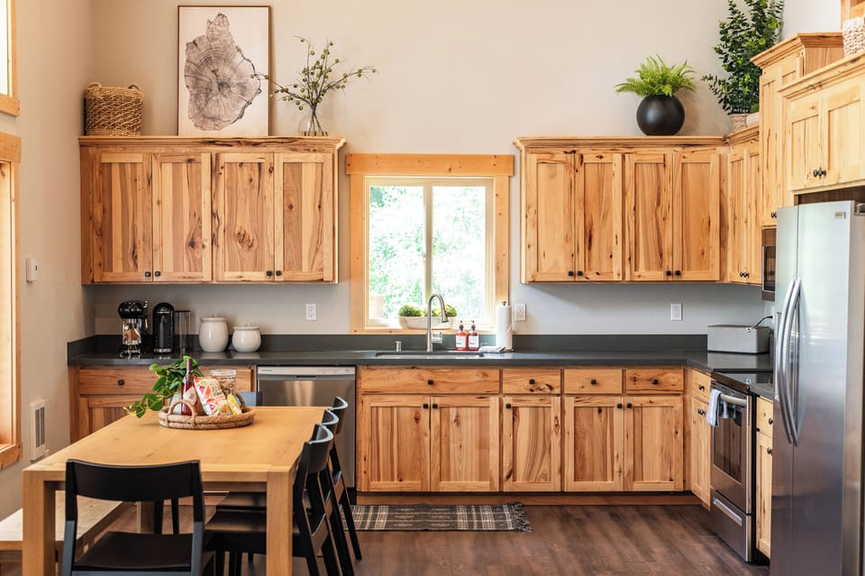 Fully stocked kitchen including glassware, food storage options, oil, spices, small appliances, etc!