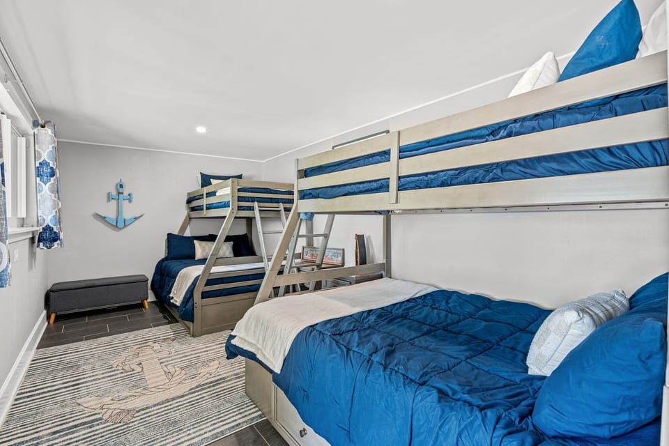 Two twin-over-full bunk beds in the downstairs guest bedroom!