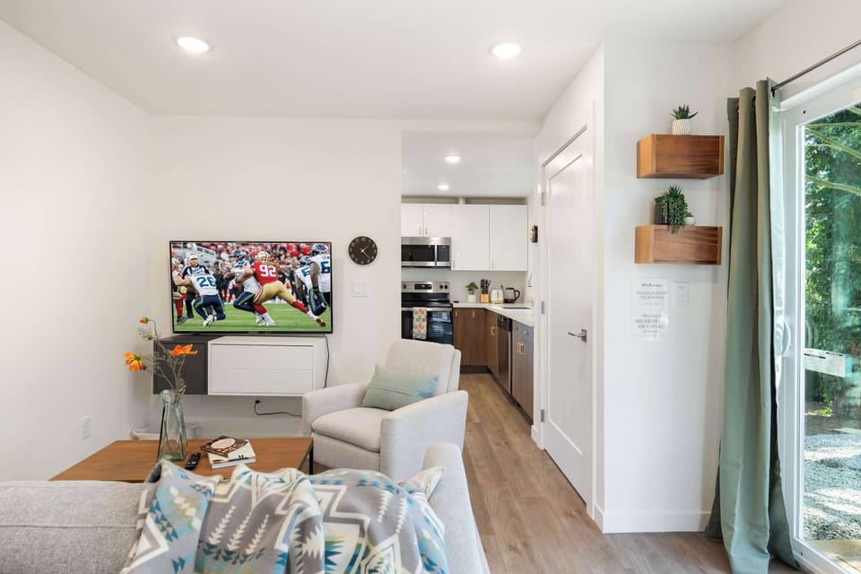Thoughtful design for real life—where kitchen convenience and living room comfort connect.