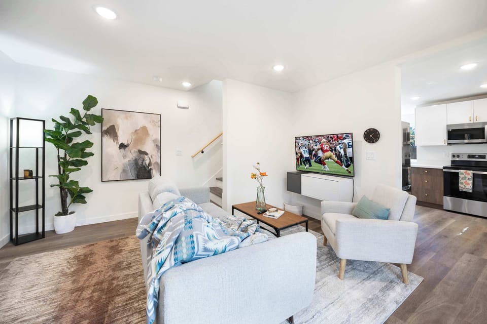 Neutral elegance with pops of color—a living space that balances style and everyday ease.