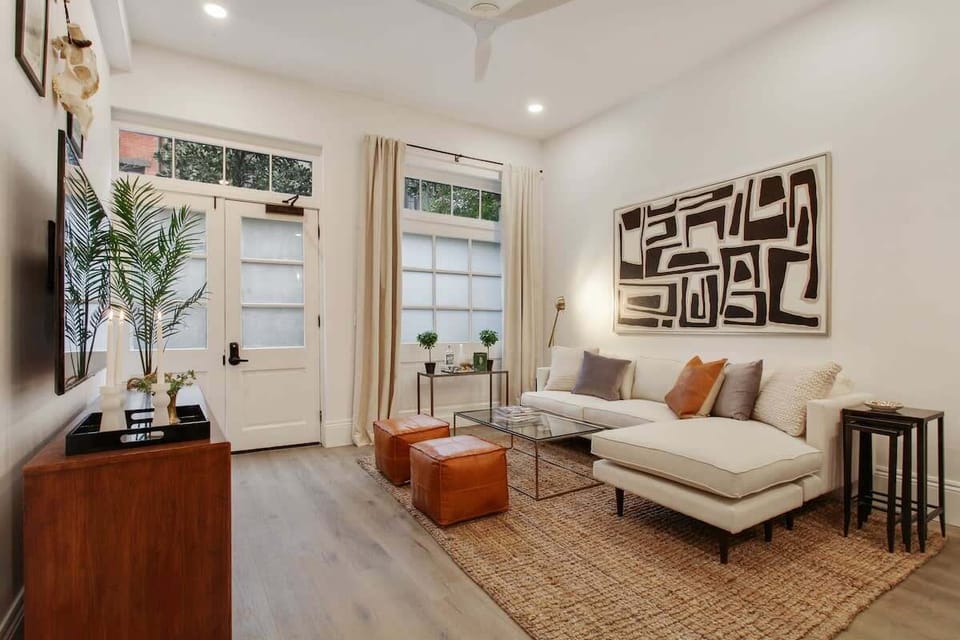 Living Room Suite 103 | Bright modern lounge space perfect for conversation relaxation or planning your day