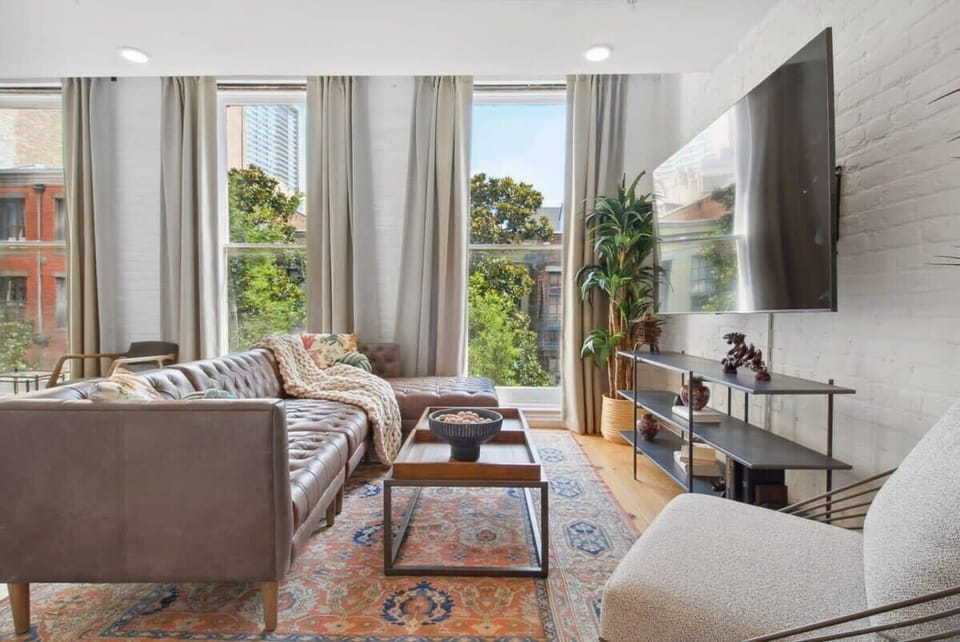 Living Room | Open Concept Lounge with TV | Unit 301 Third Floor