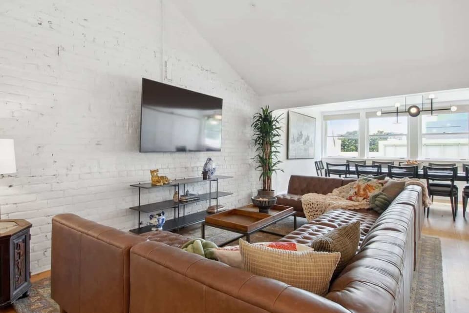 Living Room | Lounge Area with Seating and TV | Unit 401 Level 1 Fourth Floor