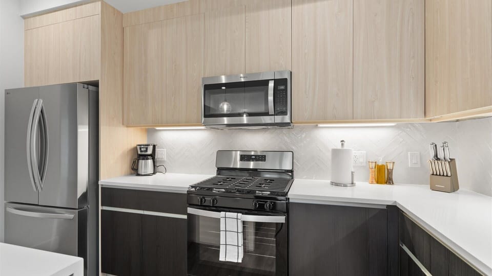 Pristine Modern Kitchen with Silver Appliances