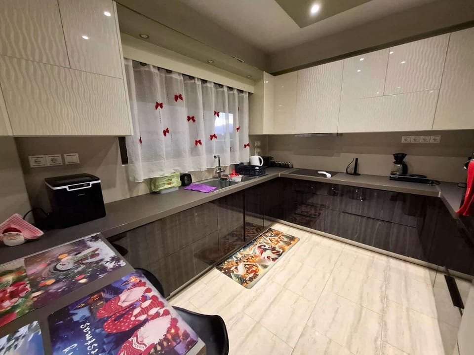 Fully equipped kitchen ready for your holiday cooking, perfect for preparing Christmas dinners or sweet treats.