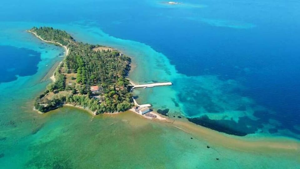 Pezonisi Island (Dream Island) – A tiny lush islet connected by a walkable path, surrounded by shallow crystal waters—perfect for a day of exploration and photos.


