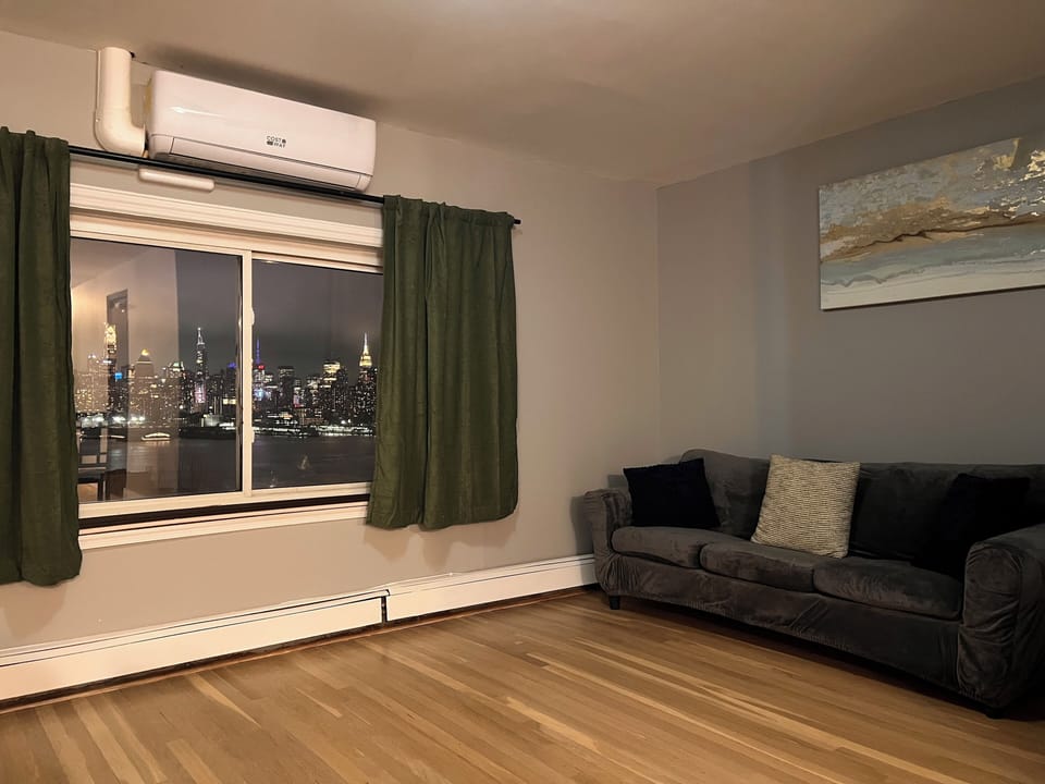 Living room with incredible city and water views