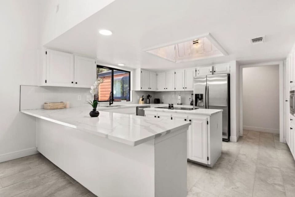 Kitchen: Bright and airy with modern appliances, perfect for culinary adventures!