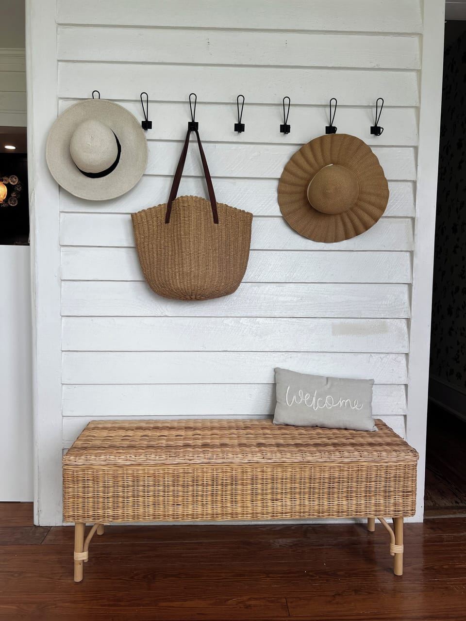 Wall coat rack in sunroom