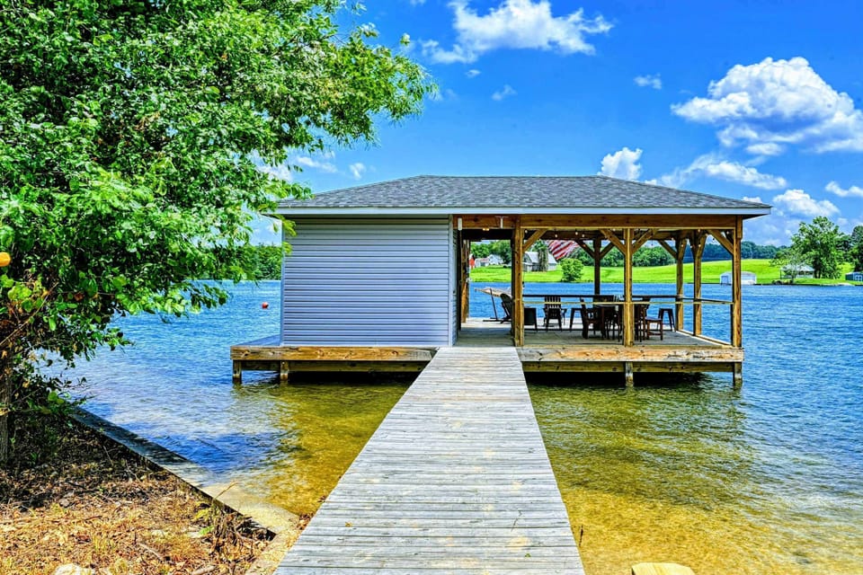 Covered Dock - Your private launch point: boat lift, jet ski ports, and a shaded landing spot just steps from the beach.