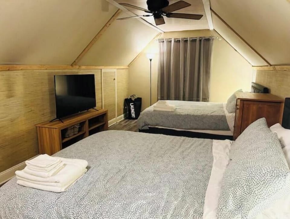Cozy second-floor room with 2 queen beds.