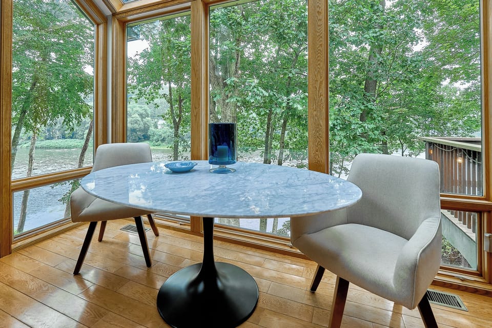 Table that can seat 4 located in the kitchen. Amazing views 