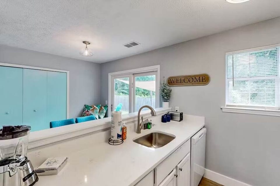 Cook, chat, and connect—this open kitchen overlooks the dining area, making it easy to stay part of the fun while whipping up your favorite meals.