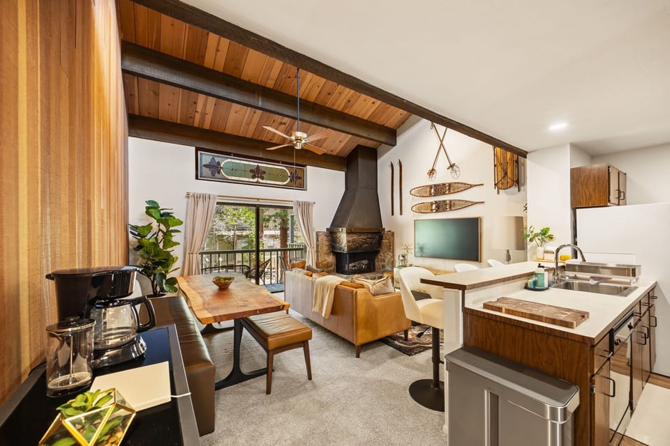 The main living area is tastefully decorated with modern and rustic finishes