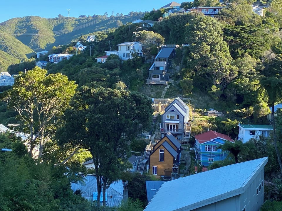 Our home from across the valley catching the last of the sun.