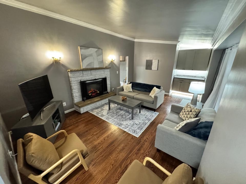 Living Room w/ 55-inch Roku Smart TV and electric fireplace