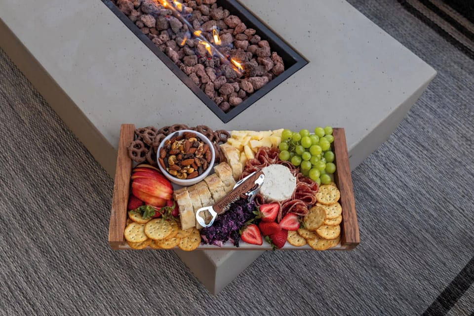 Delight in appetizers and your favorite wine by the fire pit—a picturesque setting for a memorable evening.