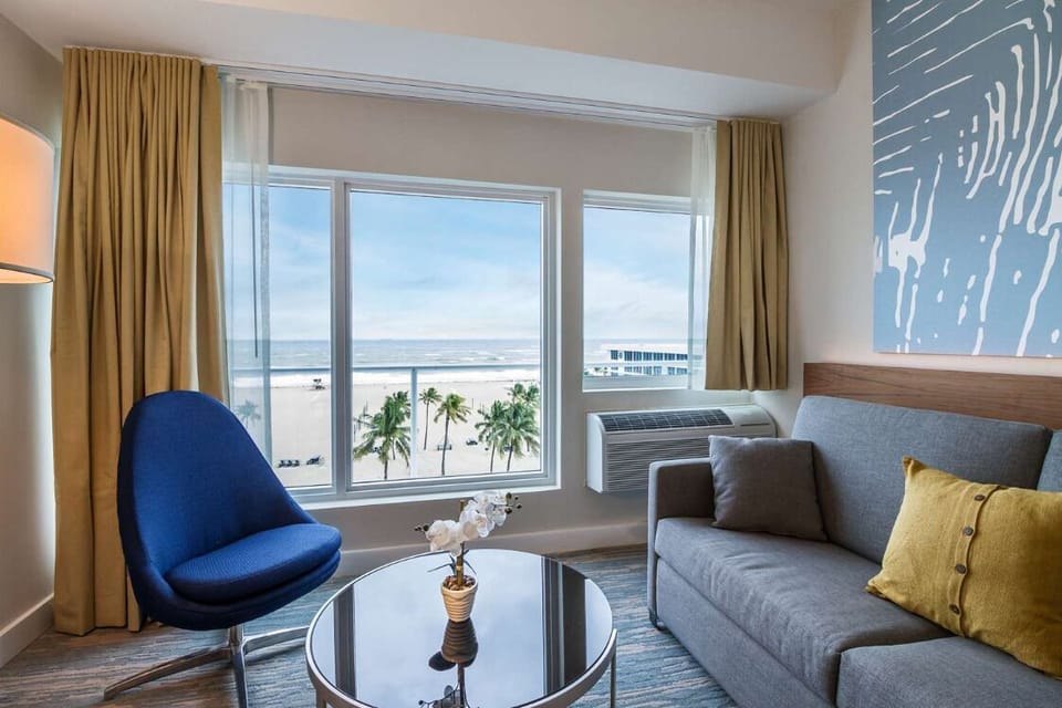 Sip coffee by the window and watch the waves roll.