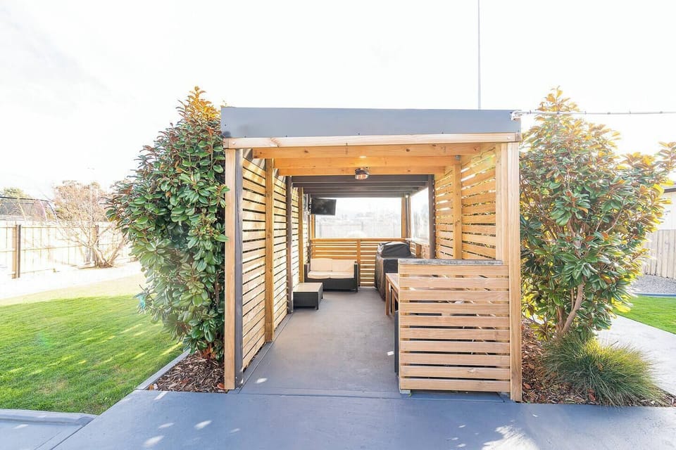 For an alfresco experience, fire up the grill and enjoy dinner outdoors in the sheltered pergola.