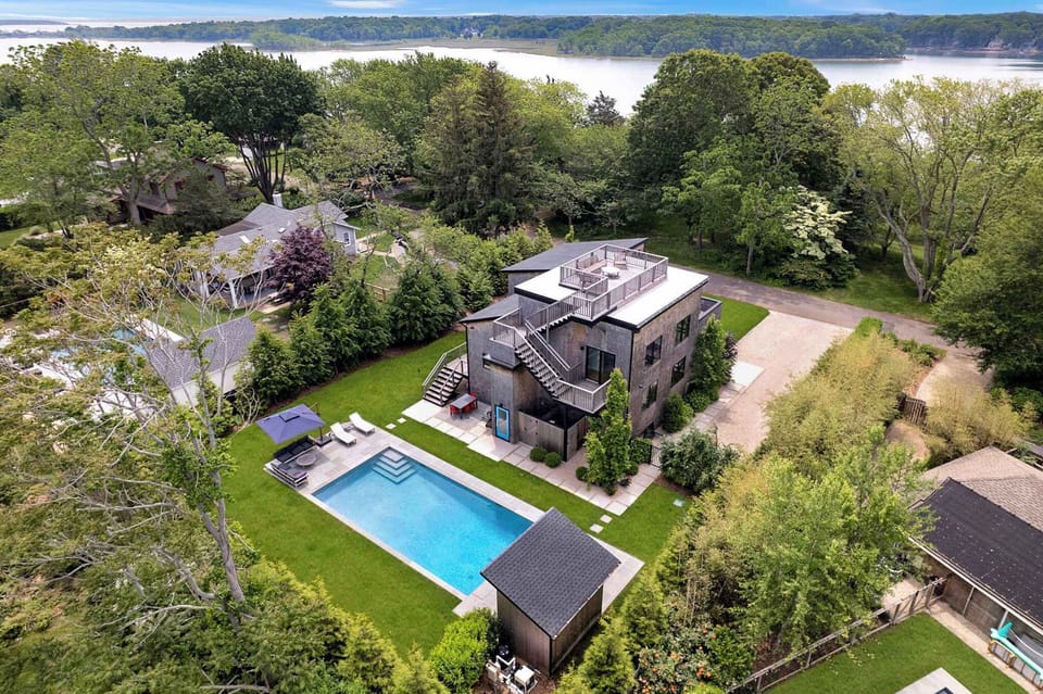 Modern multi-level home with rooftop deck and pool, Long Island Sound beyond