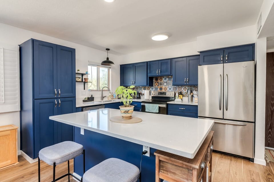 The large refrigerator has filtered water and an ice machine.