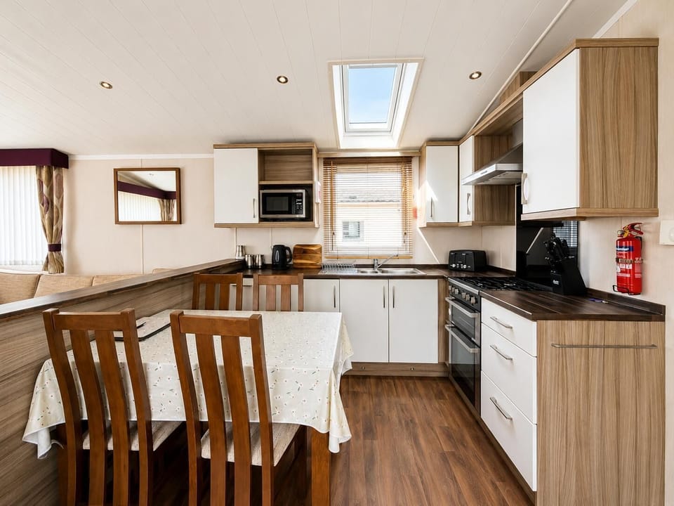 Relax and unwind while lounging in a caravan at Pakefield Holiday Park, the ideal spot for UK staycations and caravan holidays by the coast.