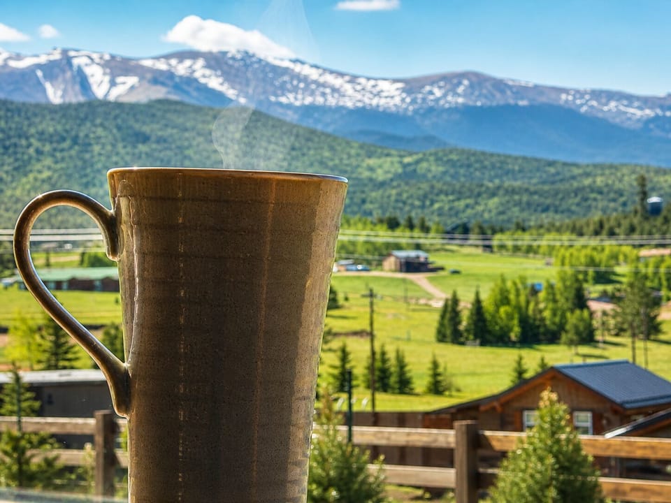 Enjoy a mountain view each morning, afternoon or evening with your favorite brew