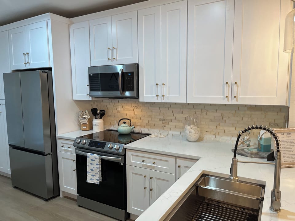 New appliances and large cabinets and pantry with pull-outs for storage!