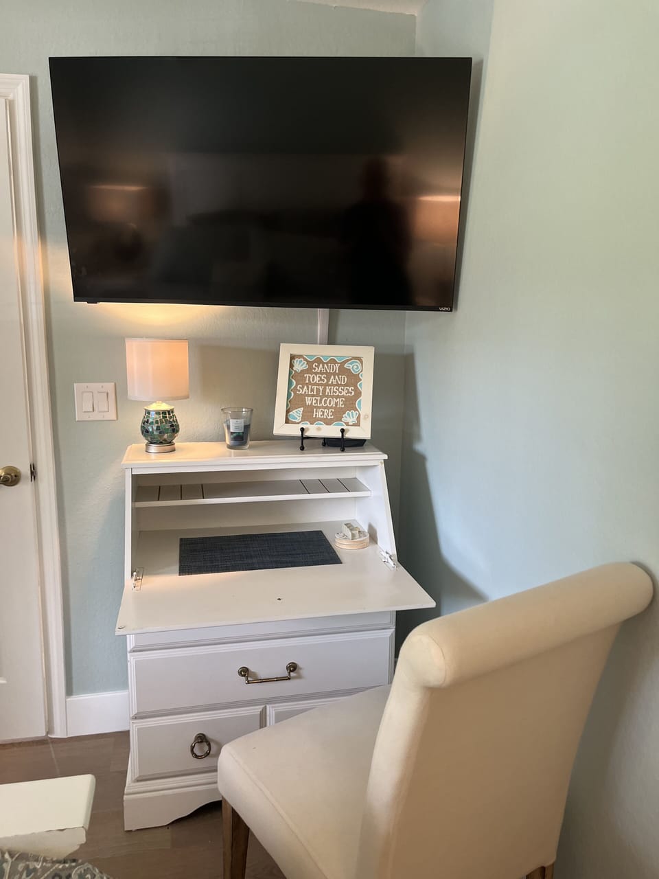 New 50" flat screen with work-from-vacation desk in guest room.