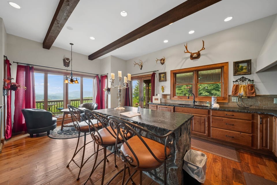 Granite Counter Island with Seating and Stone Knee Wall