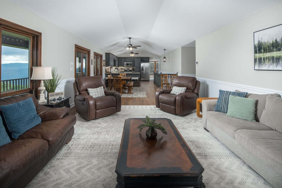 Open-concept living area with comfortable seating and beautiful Blue Ridge Mountain views