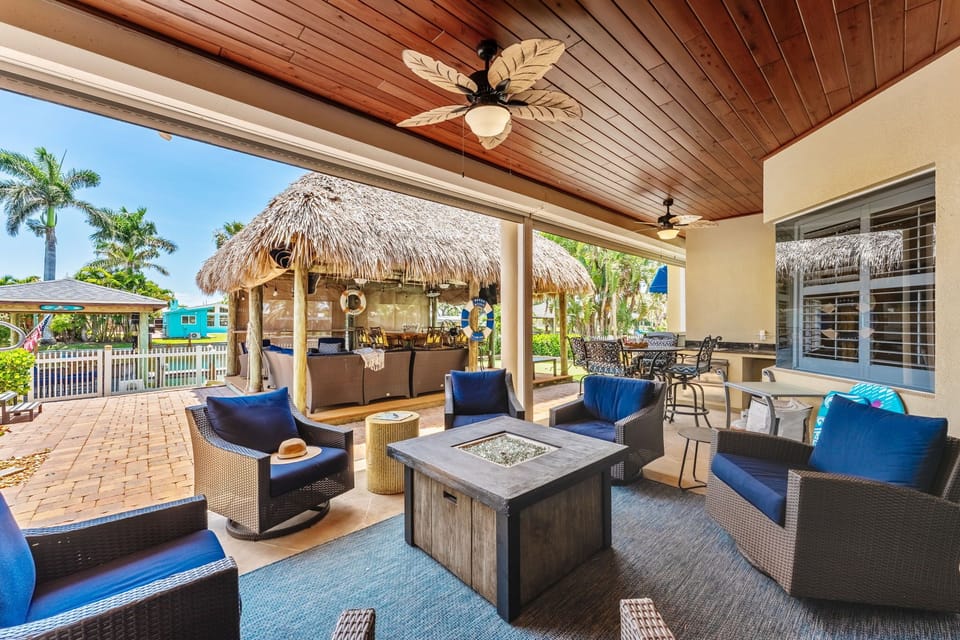 Gather under the tiki hut with friends and family