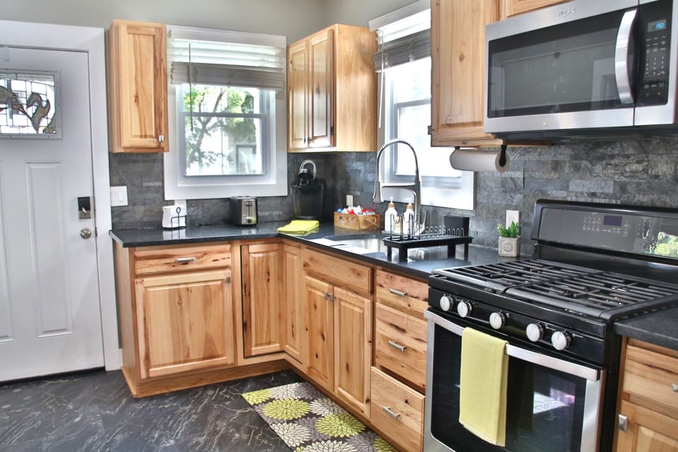 Full kitchen ideal for extended stay cook, dine, and feel right at home.