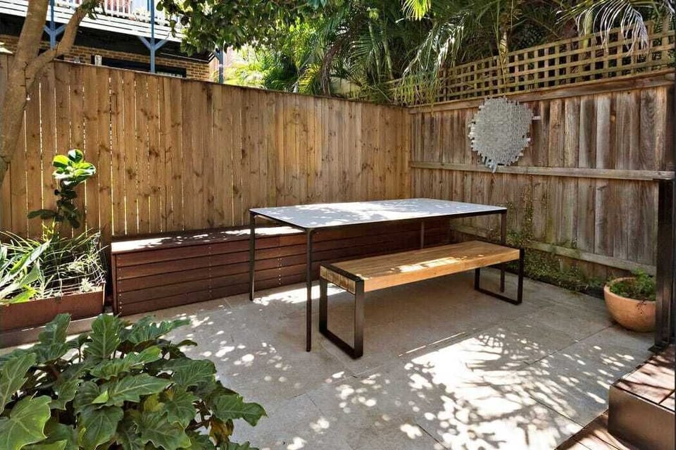The rear courtyard, idyllic shady area on a summer day