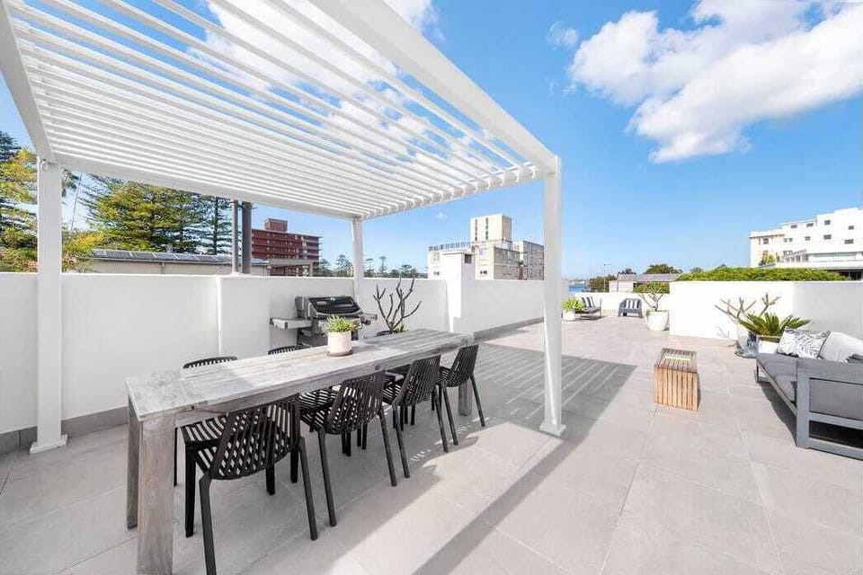 The terrace pergola and dining area