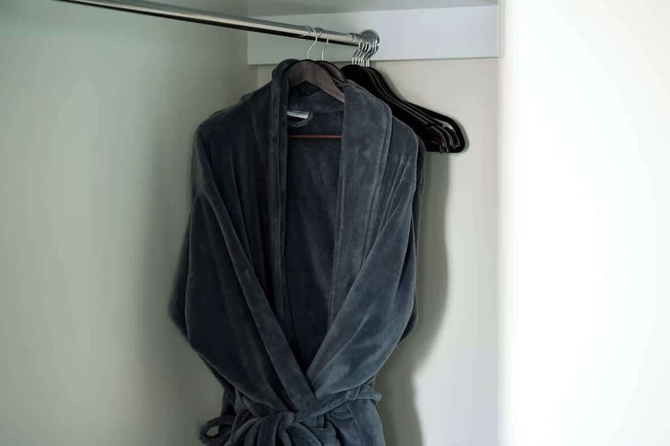 Enjoy plenty of storage space in the large walk-in wardrobe, perfect for extended stays or group visits. Keep your belongings neat and accessible in this thoughtfully designed area.