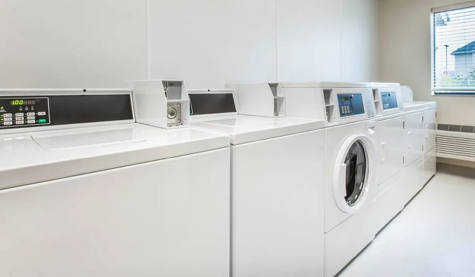 Refresh your wardrobe easily with bright, on-site laundry machines.