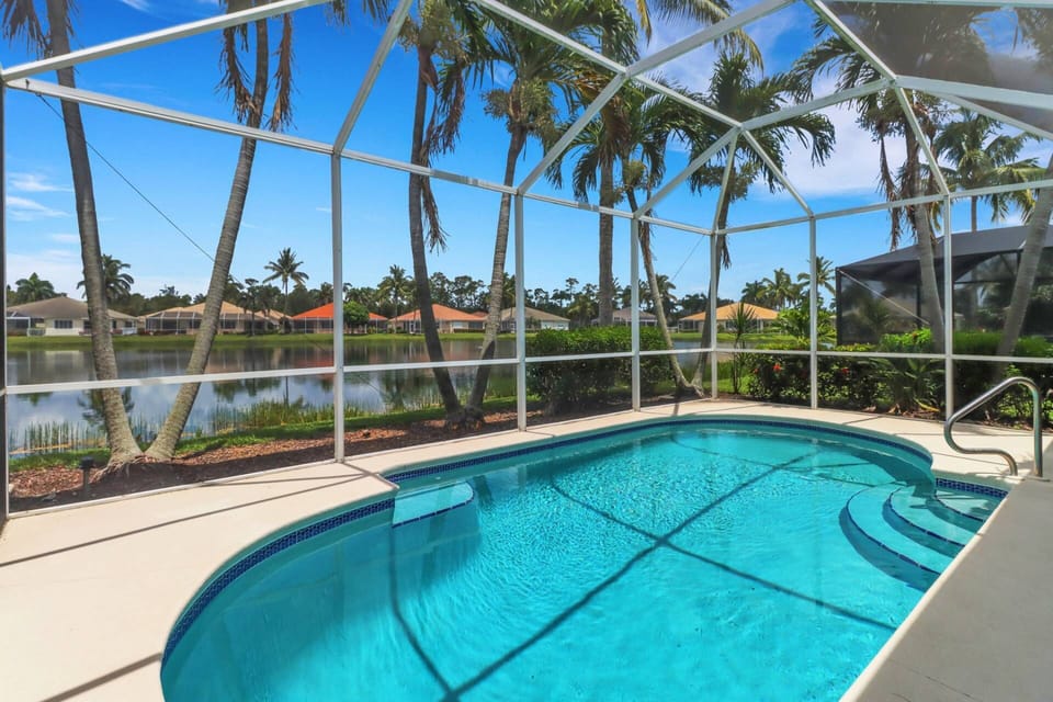 Enjoy your own private backyard pool in the fully screeded lanai, overlooking the lake behind the villa (pool is not heated.)