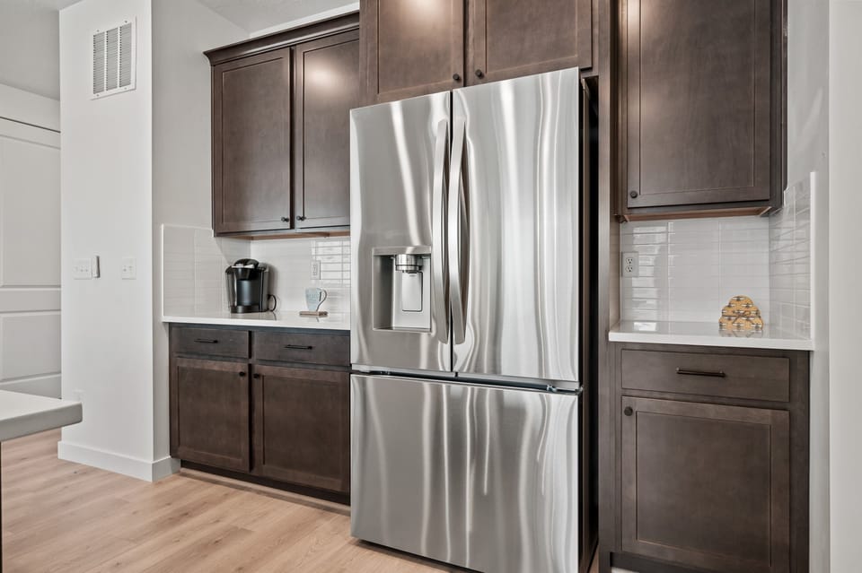 Enjoy a full-size refrigerator with an ice maker and plenty of freezer space for all your groceries and leftovers.
