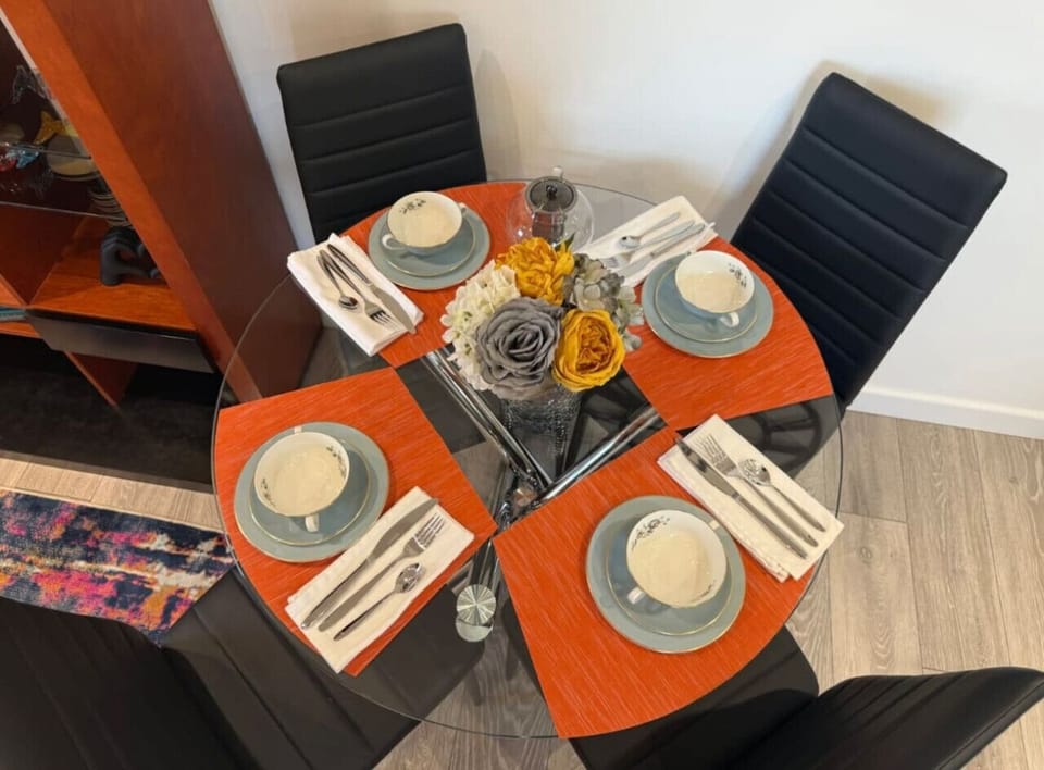 A practical dining table setup where you can enjoy meals together or use as a workspace.