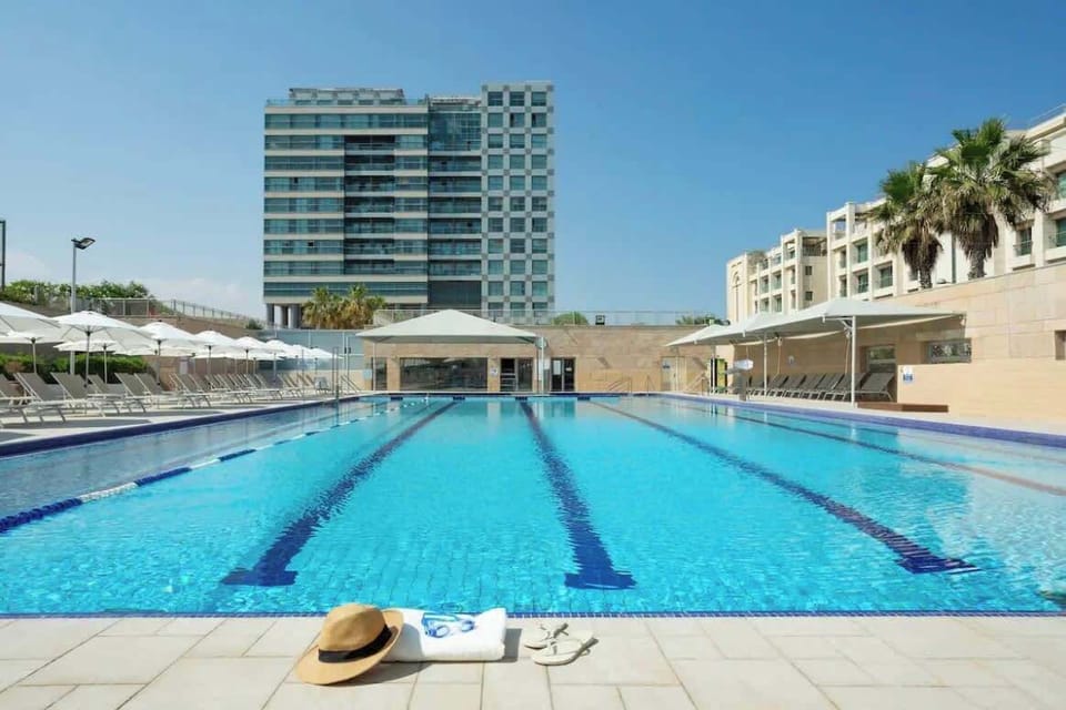 A semi-Olympic pool just steps away - ready for a refreshing escape?